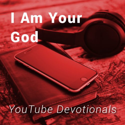 Bible, smart phone, headphones on table with text I Am Your God YouTube Devotionals