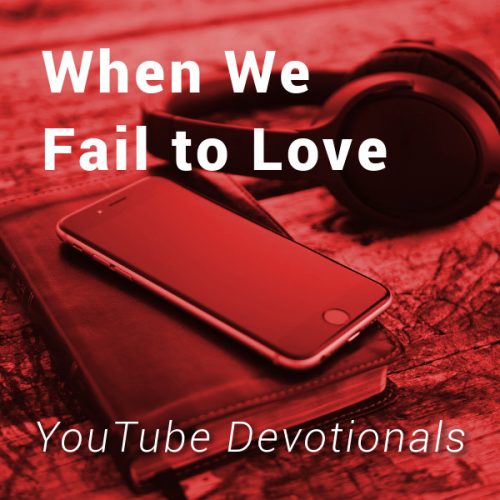 Bible, smart phone, headphones on table with text When We Fail to Love YouTube Devotionals