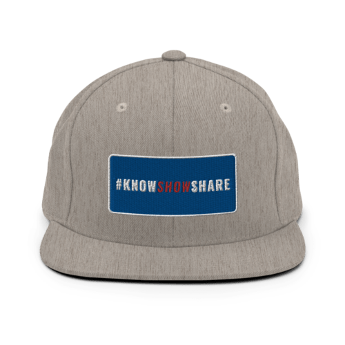 Heather gray snapback hat with hashtag Know Show Share inside a blue rectangle with white border