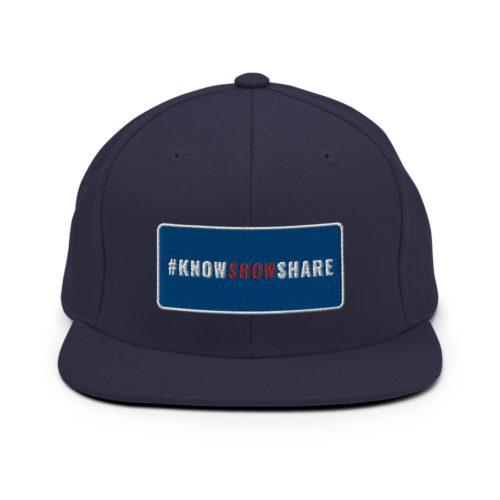 Navy blue snapback hat with hashtag Know Show Share inside a blue rectangle with white border