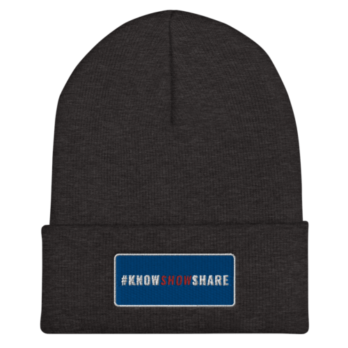 Dark gray cuffed beanie with hashtag Know Show Share inside a blue rectangle with white border